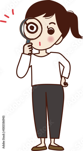 虫眼鏡で見る若い女性。