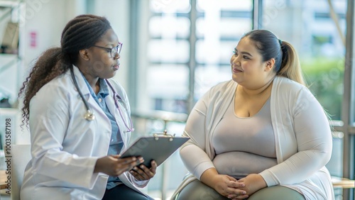 Overweight black woman talking to doctor in medical clinic