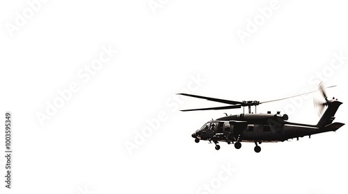 Black Hawk Helicopter in Flight Against a White Sky