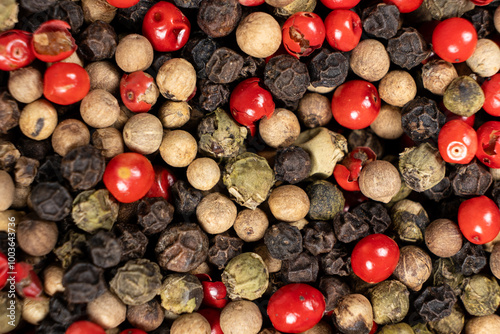 Fototapeta Naklejka Na Ścianę i Meble -  Background of a mix of colorful peppercorns top view