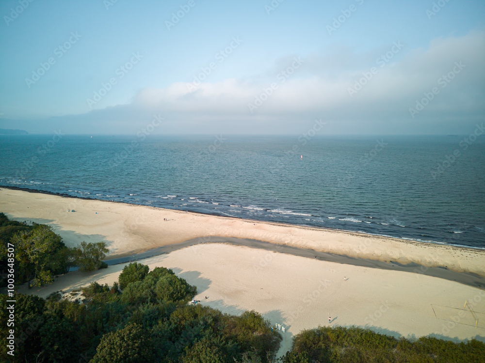 Seaside town of Jelitkowo, buildings with beach and sea.