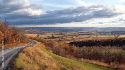 A scenic overlook along a highway, offering a panoramic view of rolling hills and valleys, perfect for travelers to stop and enjoy.