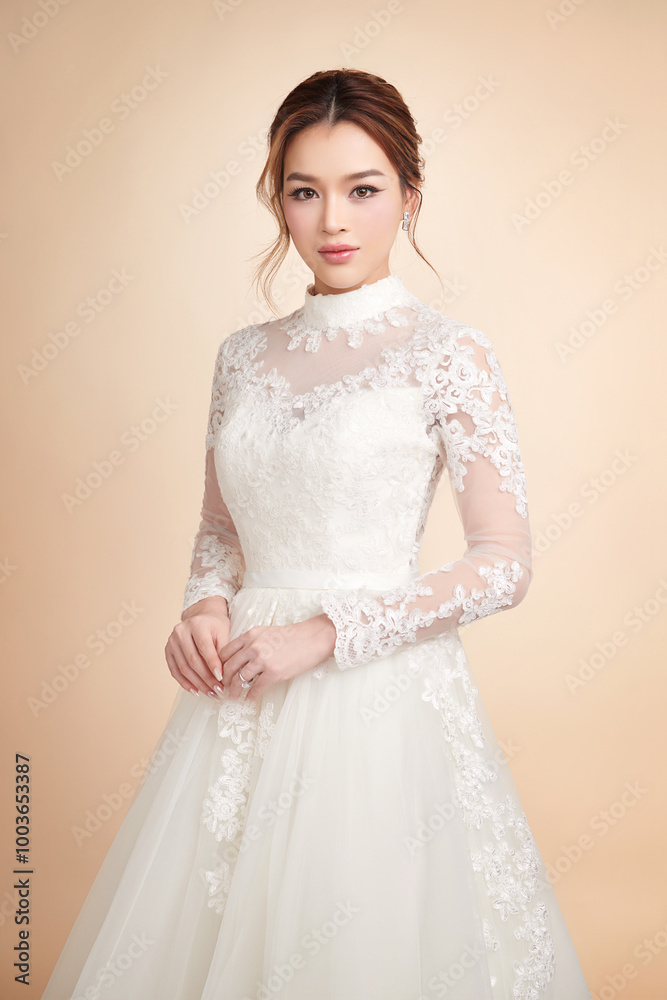 Beautiful young asian woman in wedding dress on beige background, Beautiful young asian woman in wedding dress on beige background,