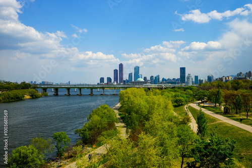 Yeongdeungpo-gu, Seoul, South Korea - June 11, 2020: Hangang Citizen Park with the background of Dangsan Railway Bridge and Seonyudo Island on Han River photo