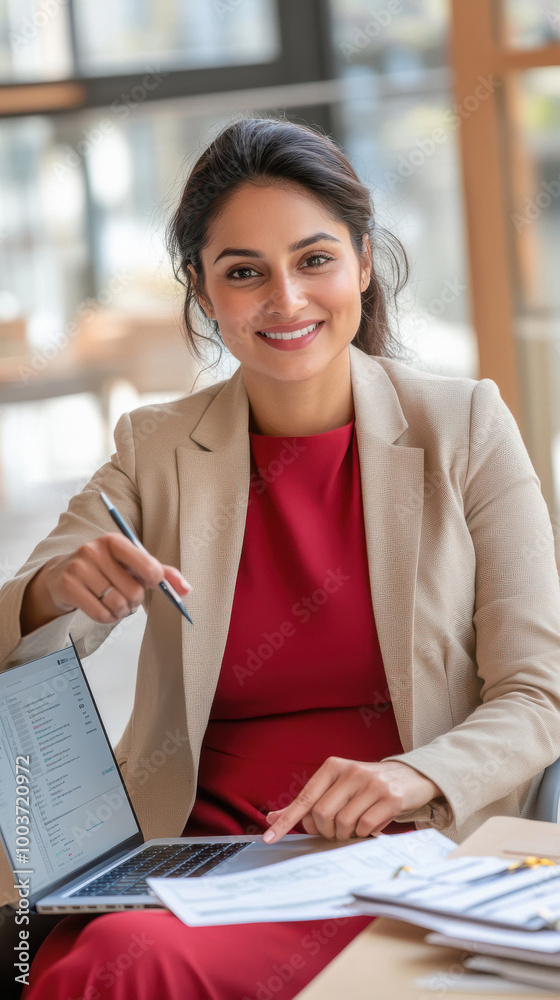 young indian woman working on laptop young indian woman working on laptop