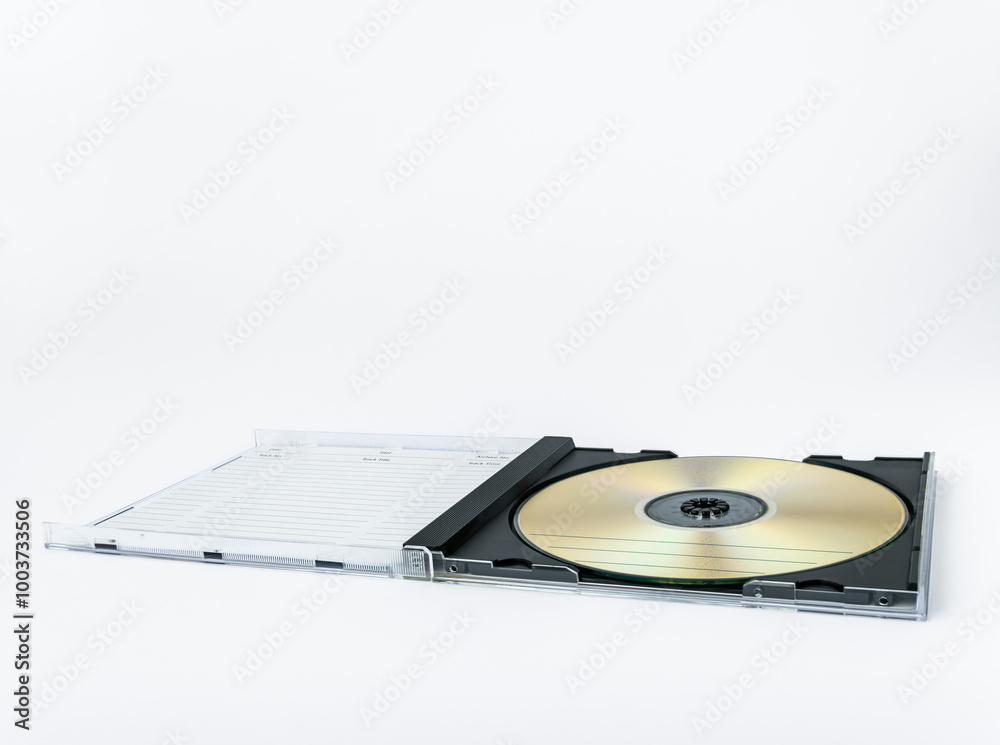 Opened box with recordable optical laser disc isolated on white background Opened box with recordable optical laser disc isolated on white background