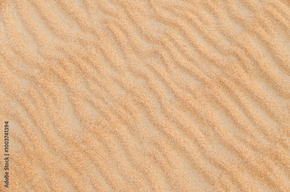 Sand with natural pattern. Beach sand background with natural wave pattern Sand with natural pattern. Beach sand background with natural wave pattern