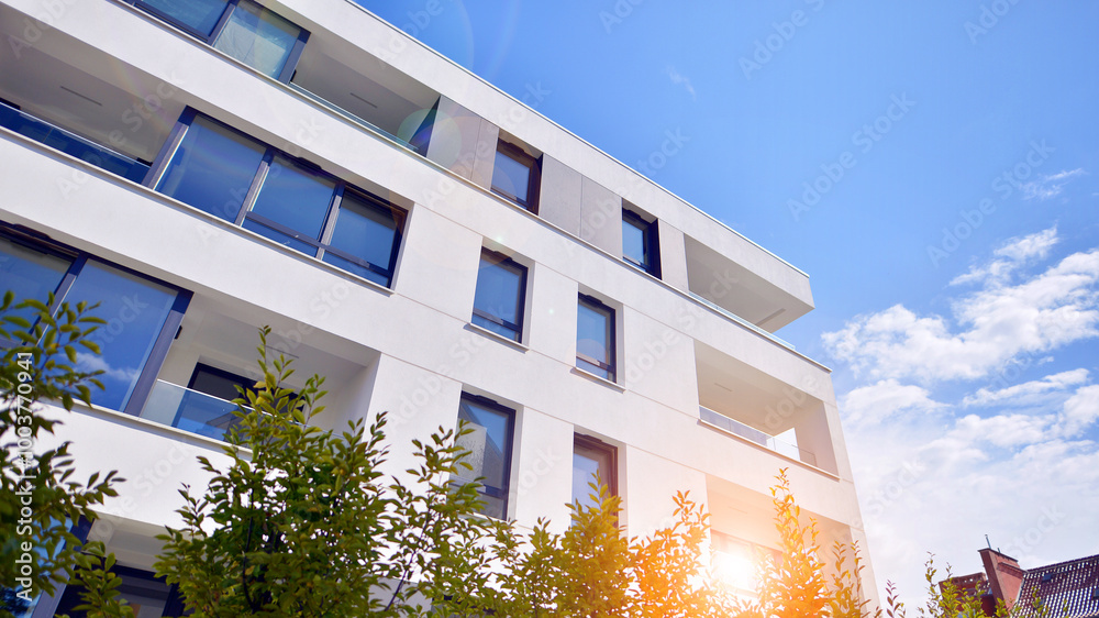 Eco apartment building saving energy and fresh air concept. European residential architecture harmonizing with nature. Eco-friendly living in city with greens. Eco apartment building saving energy and fresh air concept. European residential architecture harmonizing with nature. Eco-friendly living in city with greens.