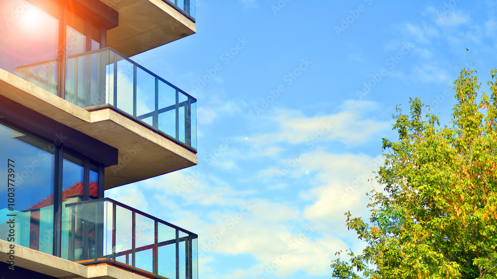 Eco apartment building saving energy and fresh air concept. European residential architecture harmonizing with nature. Eco-friendly living in city with greens. Eco apartment building saving energy and fresh air concept. European residential architecture harmonizing with nature. Eco-friendly living in city with greens.