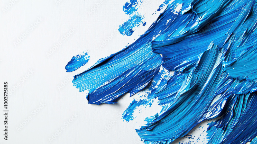 Fototapeta premium Artistic abstract sea background. Blue brush strokes on a white background. The brushstroke is bold and bright, creating a sense of movement and energy. The blue color is dominant