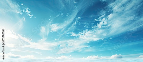 Fototapeta Naklejka Na Ścianę i Meble -  A banner themed photo with a scenic view of a clear blue sky winter clouds being swept by the wind and room for additional text or images