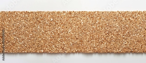 Brown cork board on a white background with copyspace for memos and reminders photo