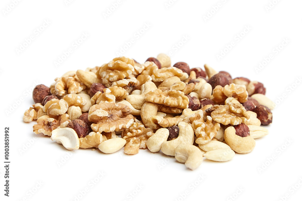 A pile of assorted mixed nuts, including walnuts, cashews, hazelnuts, and almonds, isolated on a white background. variety of textures and natural colors A pile of assorted mixed nuts, including walnuts, cashews, hazelnuts, and almonds, isolated on a white background. variety of textures and natural colors