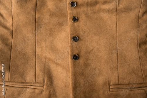 Womens light brown artificial suede vest textured background. Slow fashion concept photo