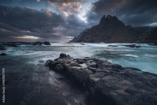Obraz na płótnie Rocky coastline in Punta del Hidalgo in Tenerife- taken on long exposure time. Dramatic sky add a mood to this picture. w salonie