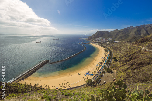 Obraz na płótnie Playa de Las Teresitas captured on a warm sunny day, with the Teide volcano visible in the background. w salonie