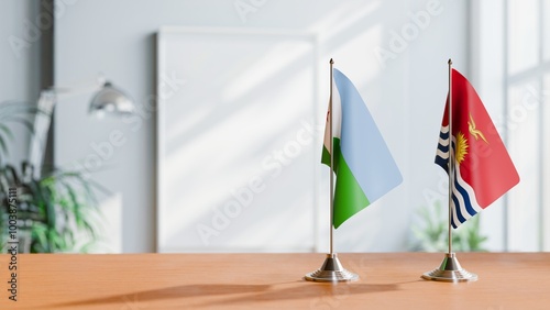 FLAGS OF DJIBOUTI AND KIRIBATI ON TABLE photo