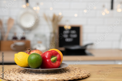 Fototapeta Naklejka Na Ścianę i Meble -  A plate with various vegetables and fruits on the kitchen table. Selective focus, Close Up