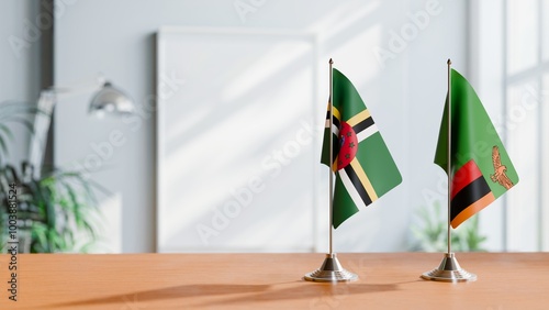 FLAGS OF DOMINICA AND ZAMBIA ON TABLE