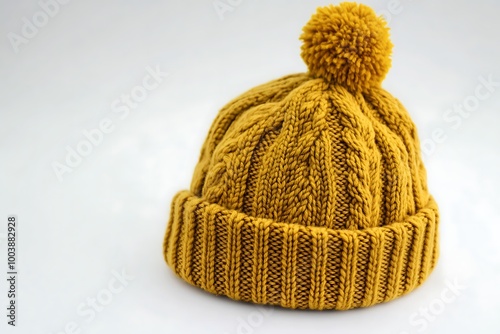 Orange knitted women's hat isolated on white, top view