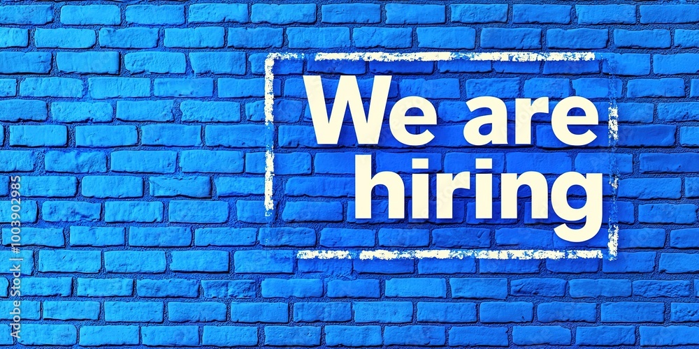 We are hiring text on the blue brick wall. Concept of employment. Generative Ai We are hiring text on the blue brick wall. Concept of employment. Generative Ai