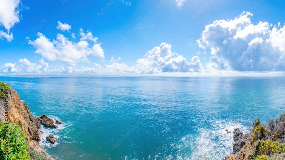 Obraz premium Serene Coastal View Under Bright Blue Skies