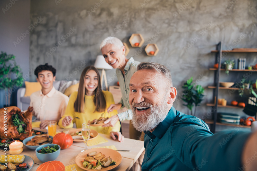 Photo of four relatives family have fun make selfie gather celebrate thanksgiving dinner apartment indoors Photo of four relatives family have fun make selfie gather celebrate thanksgiving dinner apartment indoors