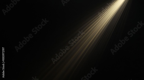 Bright light is shining through on a black background, creating a diagonal composition of light rays. This image evokes concepts such as hope, faith, and the divine