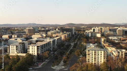 Canberra capital city of Australia – aerial cityscape at sunrise over CBD urban streets.
 photo