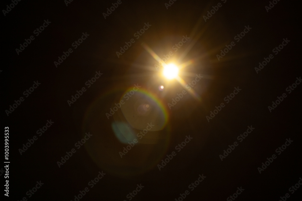 Sun flare on the black background Sun flare on the black background