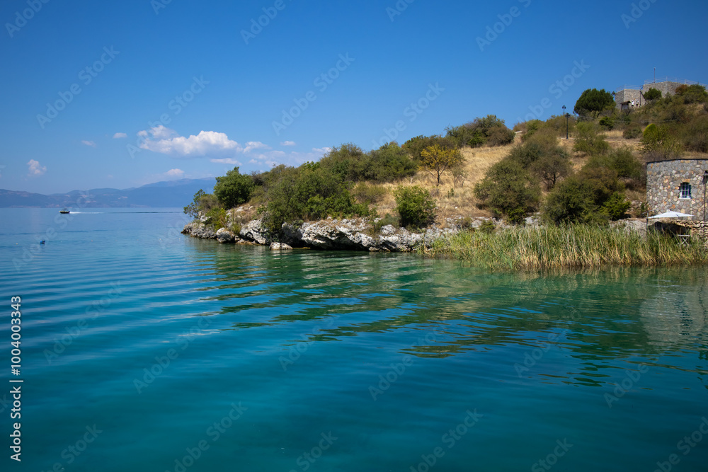 Fototapeta premium Museum on water in the Bay of Bones on the Ohrid Lake in North Macedonia. Popular tourist destination - Amazing landscape.