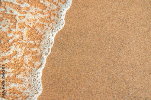 Fototapeta Naklejka Na Ścianę i Meble -  Texture of sea foam and wet sand at the beach in summer