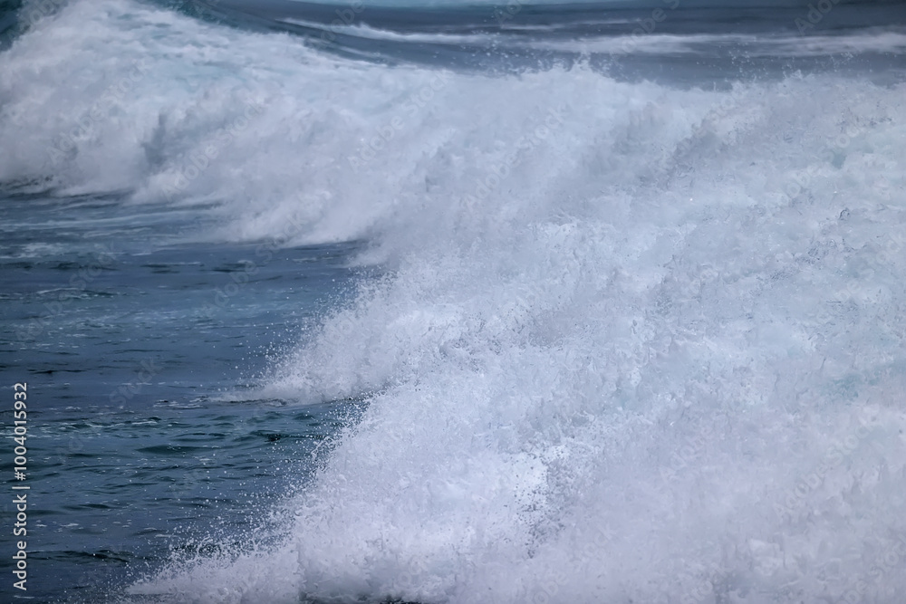 Fototapeta premium wave in the ocean abstract background, blue sea texture motion