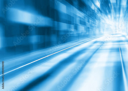 Abstract blue light trails representing speeding through city