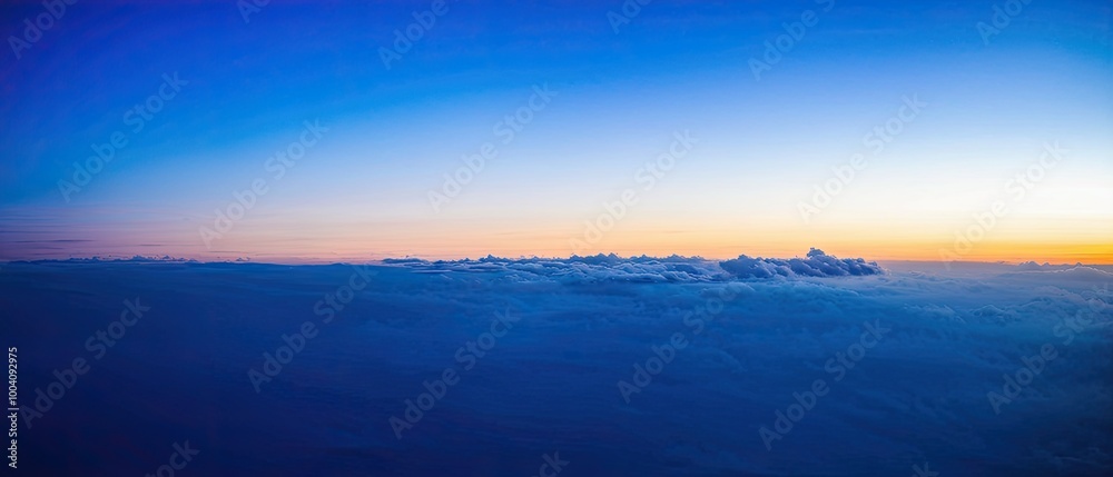 Fototapeta premium Aerial View of Clouds During Sunset