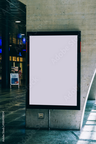 Fototapeta Naklejka Na Ścianę i Meble -  Clear Billboard in public place with blank copy space screen for advertising or promotional poster content, empty mock up Lightbox for information, blank display in station area with daylight