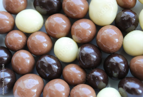 Chicolate candy mix, chocolate covered drops photo