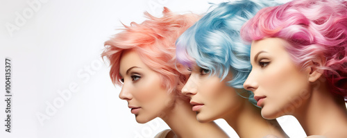 Three women showcase vibrant hairstyles with pastel curls in a creative styling session against a light backdrop