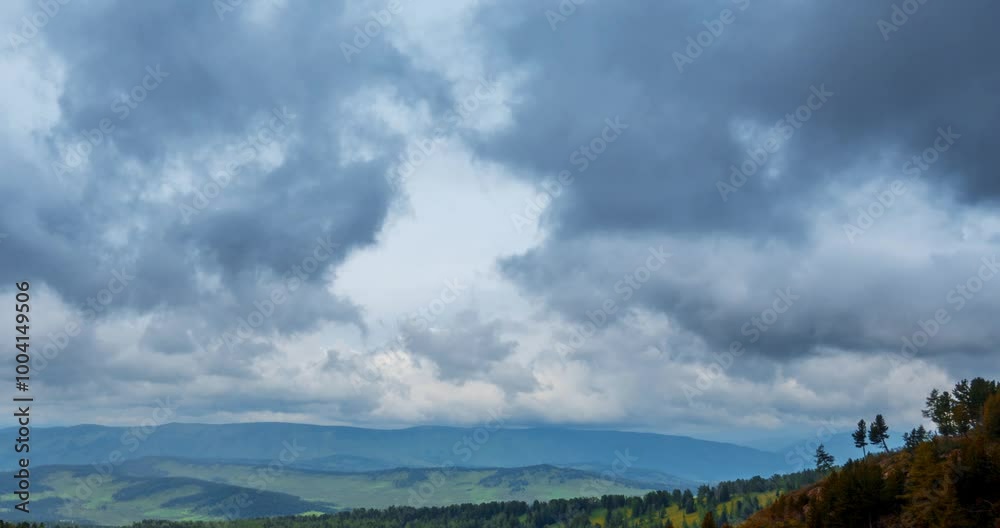 Mountain lake time-lapse at the summer or autumn time. Wild nature and rural field. Fast clouds movement, green grass and dramatic sky. Motorised dolly slider movement Mountain lake time-lapse at the summer or autumn time. Wild nature and rural field. Fast clouds movement, green grass and dramatic sky. Motorised dolly slider movement