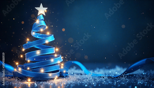 Blue ribbon forming a christmas tree with lights and sparkling snowflakes