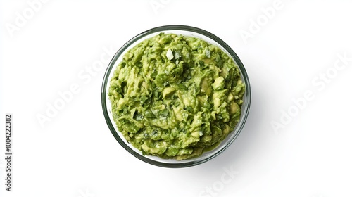 A green guacamole dip in a clear glass bowl, photographed from above. The background is white and you can easily cut out the image.