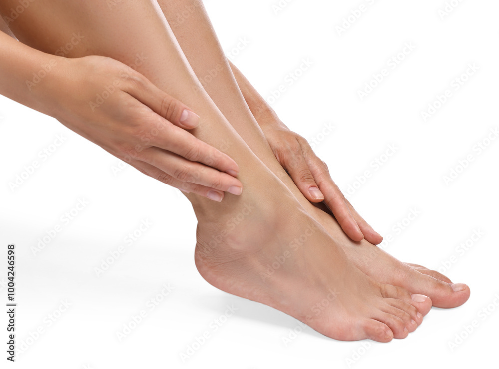 Woman touching her smooth feet on white background, closeup Woman touching her smooth feet on white background, closeup