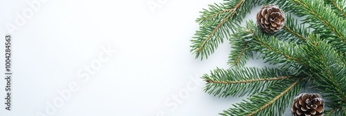 A Christmas tree with pine cones and green leaves