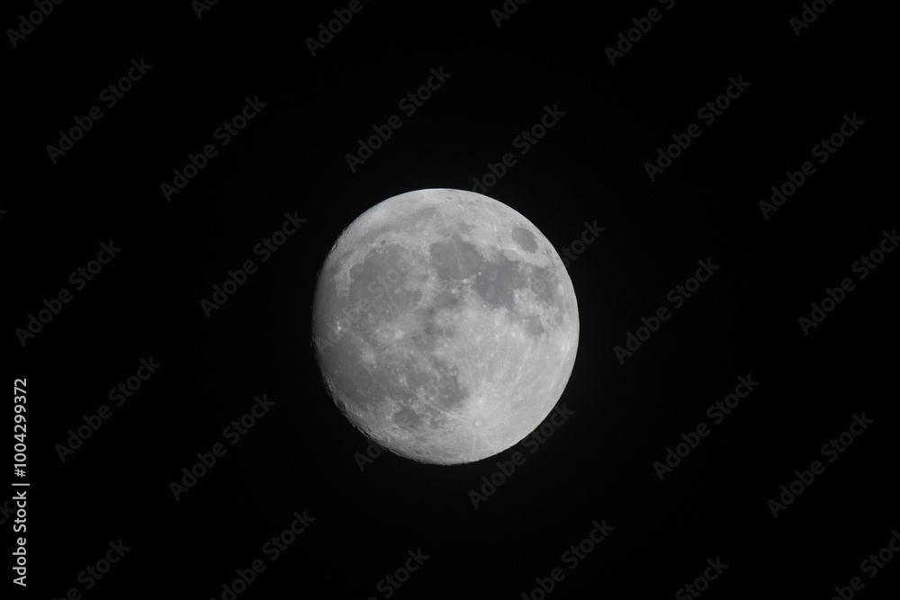 Naklejka premium The Moon in evening time with Bllack sky background