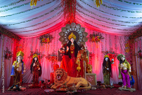 A beautiful idol of Maa Durga being worshipped at a pandal during Navratri. Navratri is biggest religious festival of Hinduism photo