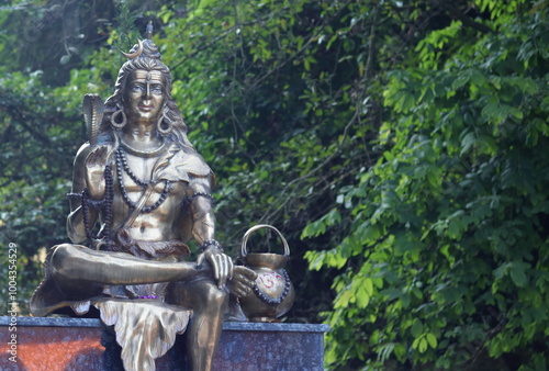 A statue of Lord Shiva in a sitting posture at Tapkeshwar Temple in Dehradun.  photo