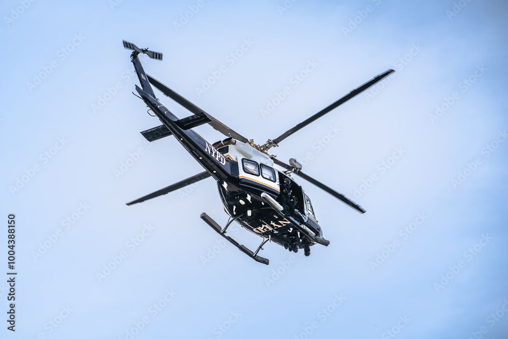 NYPD search and rescue helicopter in action view, New York city NYPD search and rescue helicopter in action view, New York city