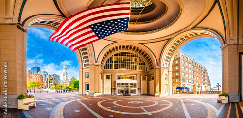 Obraz na płótnie Boston harbor Rowes Wharf passage and cityscape panoramic view, large flag of America, Massachusetts w salonie