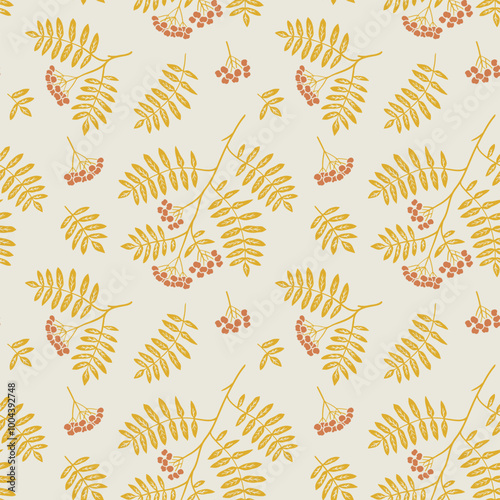 Fall seamless pattern with rowan berries and leaves. Graphic background with autumn branch. Hand drawn repetitive illustration and wallpaper art.