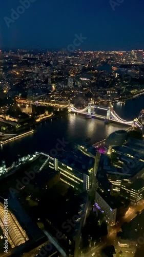 Wallpaper Mural London aerial vertical video over Tower Bridge Thames landmarks night Torontodigital.ca